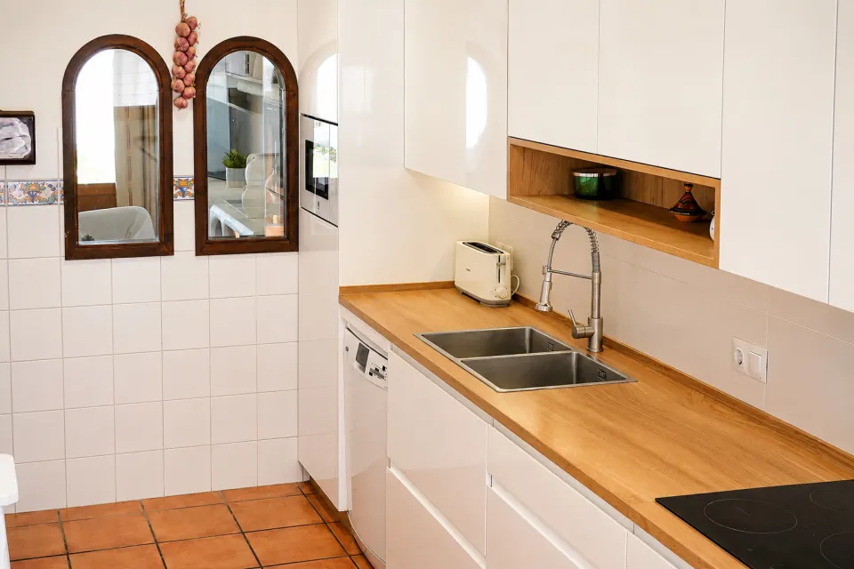 Kitchen with sink and microwave column