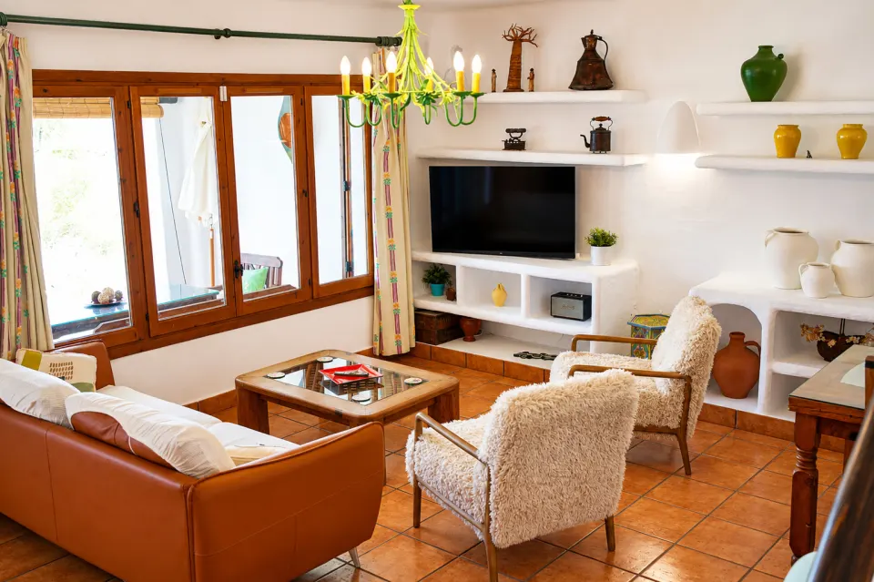 Living room with large window onto the porch